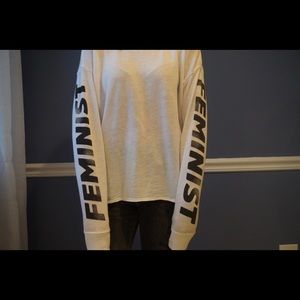 Distressed feminist long sleeve top